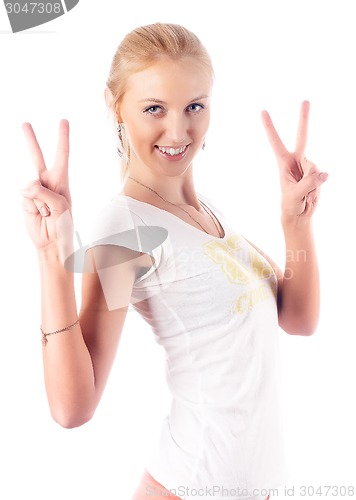 Image of Attractive woman with victory sign
