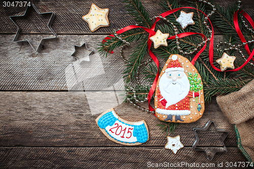 Image of Christmas Santa Claus and New Year star cookies in rustic style