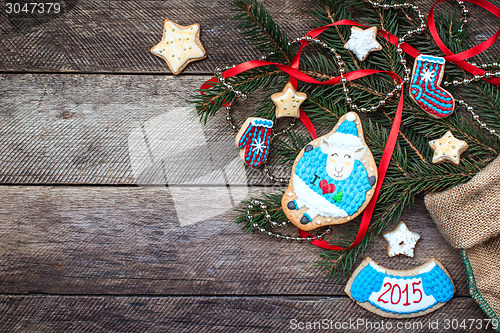 Image of New Year 2015 sheep cookie and decoration on wood