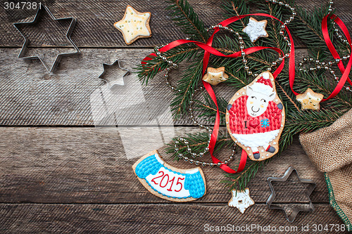 Image of New Year 2015 and Xmas sheep cookie and pastry on wood