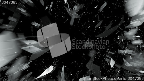 Image of Destructed or Shattered glass on black with motion blur