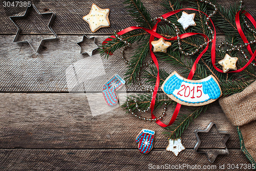 Image of Christmas and New Year 2015 decorated cookies in rustic style on