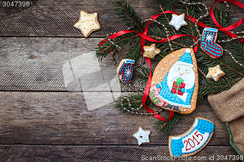 Image of Christmas Santa and New Year star cookies in rustic style