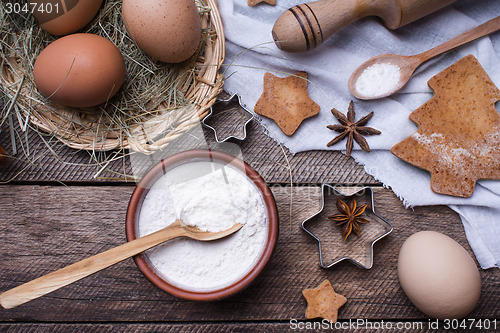 Image of Flour and eggs for Christmas pastry and holiday cookies 