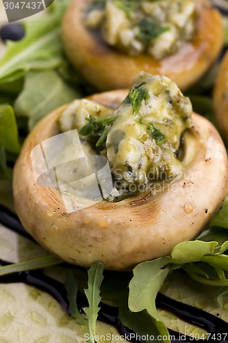 Image of Delicious stuffed mushrooms with cheese and pesto