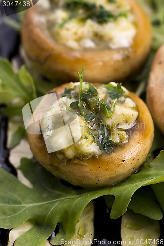 Image of Delicious stuffed mushrooms with cheese and pesto