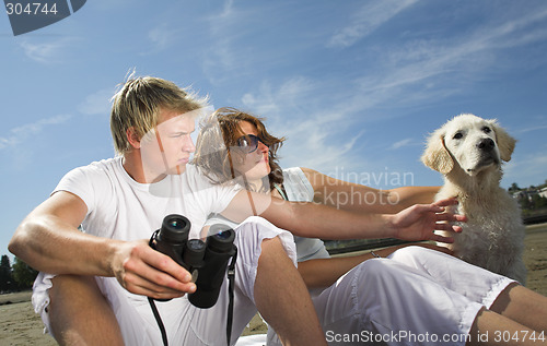 Image of young couple on the beach