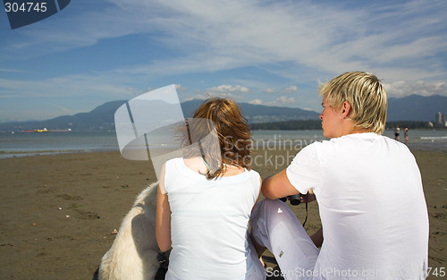 Image of young couple on the beach