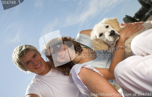 Image of young couple on the beach