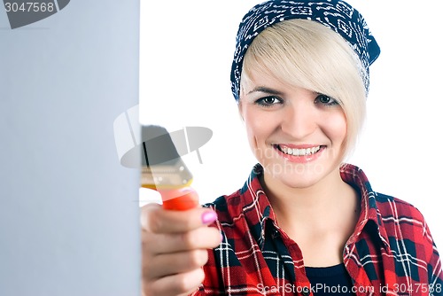 Image of Attractive woman painter