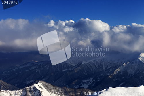 Image of Top view on off-piste slope in sun day