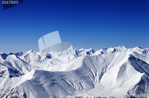 Image of Winter snowy mountains with avalanche slope