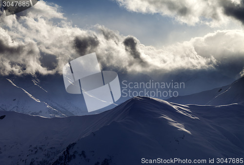 Image of Evening mountain and sunlight clouds