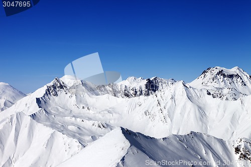 Image of Snowy mountains in nice sun day