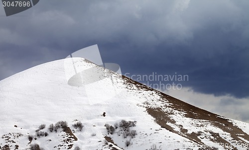 Image of Off-piste slope and overcast gray sky