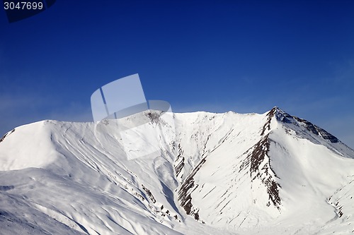 Image of Snowy mountains in wind day