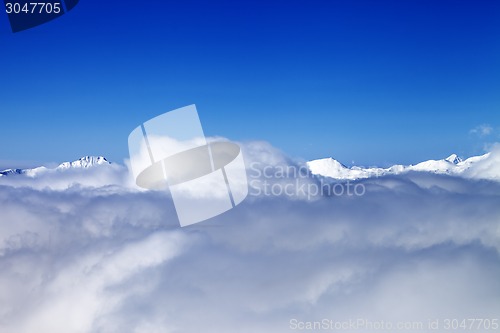 Image of Mountains under clouds in nice day