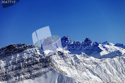 Image of Snowy rocks in nice sun day