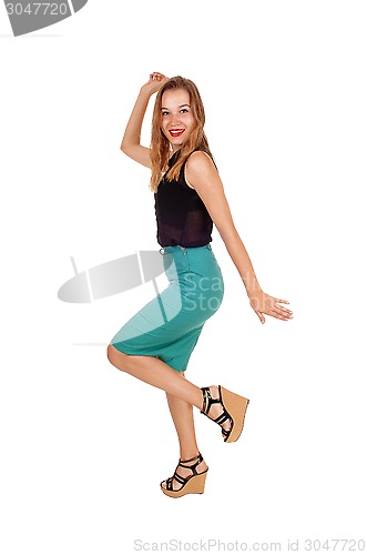 Image of Dancing young woman.