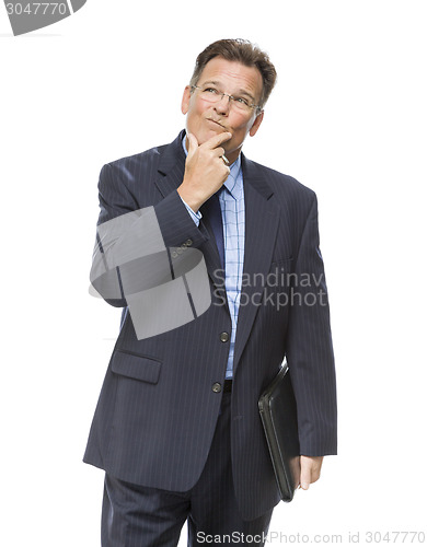 Image of Businessman With Hand on Chin and Looking Up and Over
