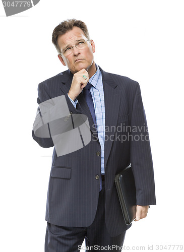 Image of Businessman With Hand on Chin and Looking Up and Over