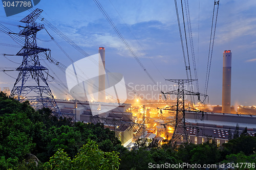 Image of coal power station and night blue sky 