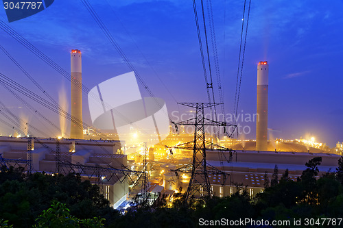 Image of coal power station and night blue sky 