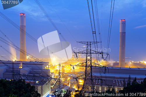 Image of coal power station and night blue sky 