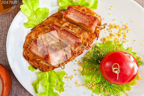 Image of veal meat with bacon