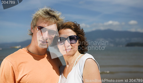 Image of young couple on the beach