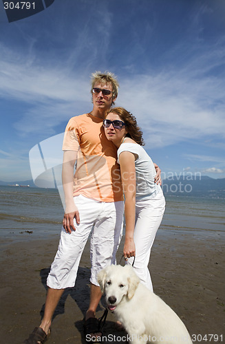 Image of young couple on the beach