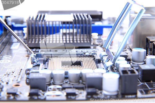 Image of detail of modern computer mainboard (motherboard) 