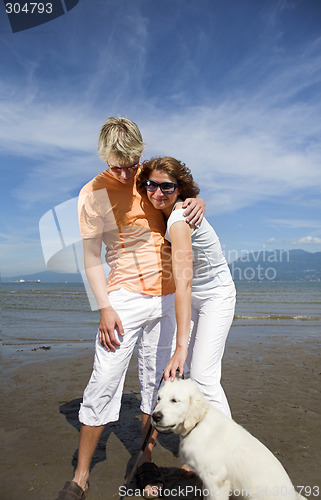 Image of young couple on the beach