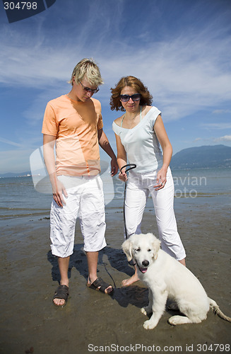 Image of young couple on the beach