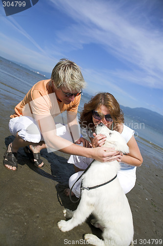 Image of young couple on the beach