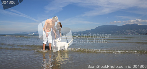 Image of young couple on the beach