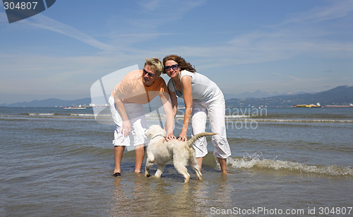 Image of young couple on the beach