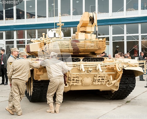 Image of Crew near tank