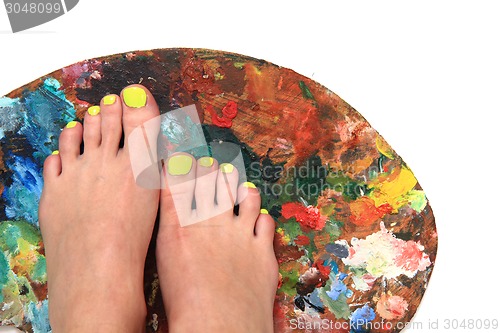Image of women feet (pedicure)  with color palette 