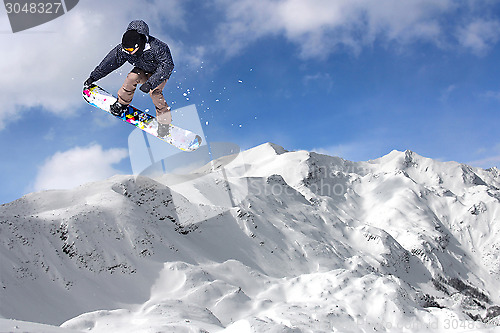 Image of Jumping snowboarder