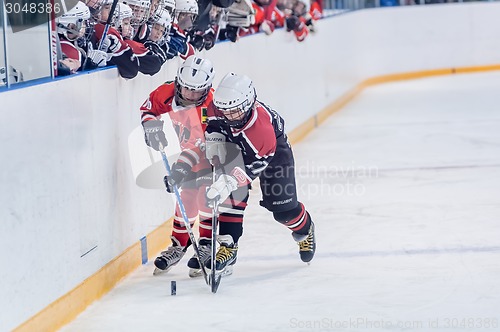 Image of Game of children ice-hockey teams