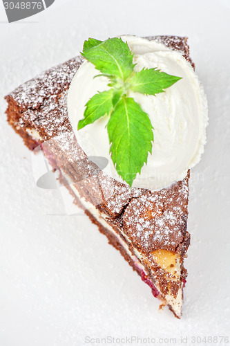 Image of chocolate cake with jam ice cream