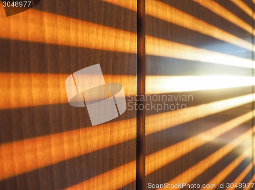 Image of Sunlight through shutter