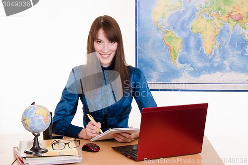 Image of Girl working in a travel agency