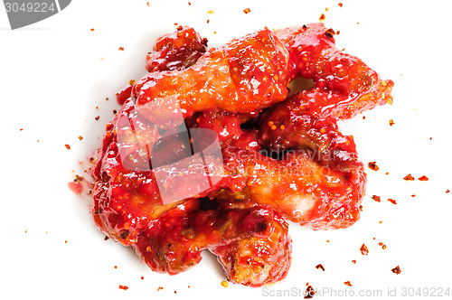 Image of chicken wings in raspberry sauce
