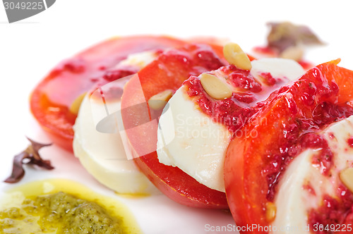 Image of Caprese antipasto salad with mozarella cheese, tomatoes 