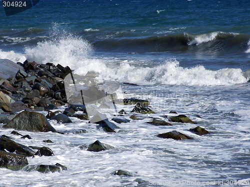 Image of Wet stones in waves of the Black Sea