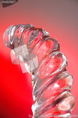 Image of Ice sculpture on red background
