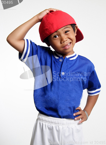 Image of Funny Face boy scratching his head