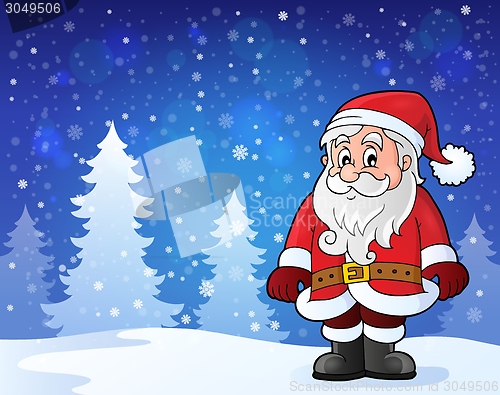Image of Santa Claus standing in snow